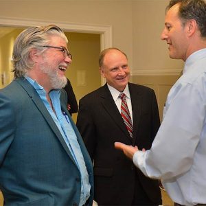 Chris Offutt (left), Dean Glenn Hopkins, and Associate Dean Richard Forgette | Photo by Robert Jordan/UM Communications