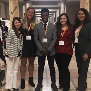 University of Mississippi students (left to right) Madison Savoy, Abigail Garrett, Cellas Hayes, Lindsey Miller and Brittany Brown present their undergraduate research during Posters in the Rotunda March 20 at the state Capitol. Photo by Shea Stewart/University Communications