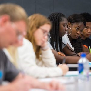 Participants in the Mississippi Bridge STEM Program take notes in a class led by UM mathematics instructor Kelvin Holmes. Photo by Kevin Bain