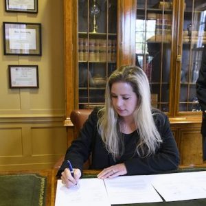 Blair McElroy, UM senior international officer, signs a memorandum of agreement with the National University of Civil Engineering in Vietnam for student and faculty exchanges and research collaborations in May. Photo by Thomas Graning/Ole Miss Digital Imaging Services