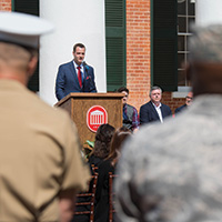 Andrew Newby speaks at the parking pass ceremony.