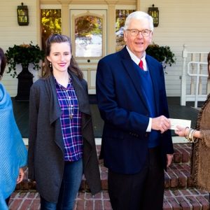 Karan (left) and Eric Clark of Oxford, present a check to Sandra Guest, vice president of the UM Foundation. The gift adds a $10,000 contribution to the existing John S. and Mamie Craft Clark Memorial Scholarship Endowment Fund at the University of Mississippi. Joining them is the 2018 Clark Scholar, Margaret Jordan, a freshman mathematics major from Pearl.