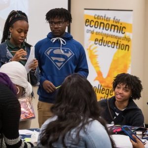 Students from Greenville High School compare notes on their group project during the STRIVE! Conference at the UM Jackson Avenue Center. Photo by Megan Wolfe