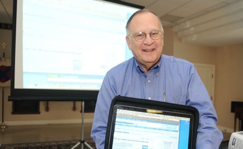 Dr. Lee N. Bolen has been honored with a scholarship fund in his name at UM. Pictured here, Bolen also offered his time in the community by teaching courses on computer technology for senior citizens.
