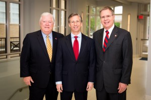 Former Mississippi Gov. Haley Barbour (left) visits with Mayo Flynt, president of AT&T Mississippi, and UM Chancellor Jeffrey Vitter on the Ole Miss campus. Photo by Bill Dabney, UM Foundation