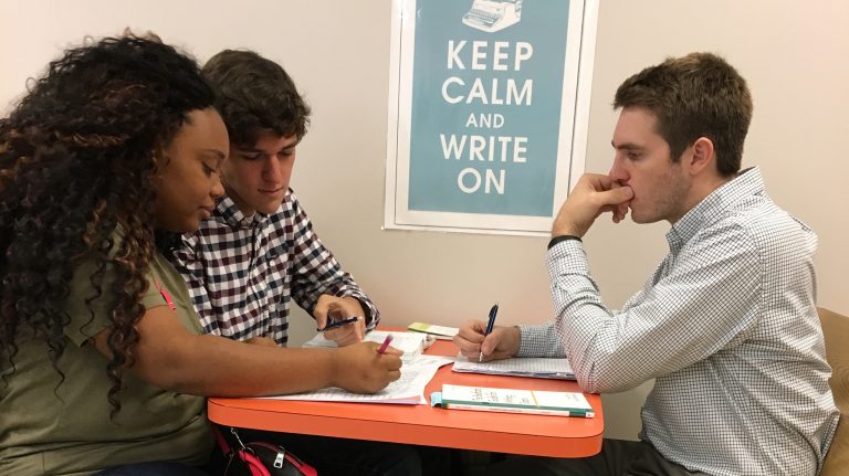 Josh Green (right), director of Independence High School’s writing center, oversees a tutoring session with students Josh Figures and Martasia Copeland. Green reached out to the University of Mississippi – DeSoto Writing Center for resources and ideas. Submitted Photo