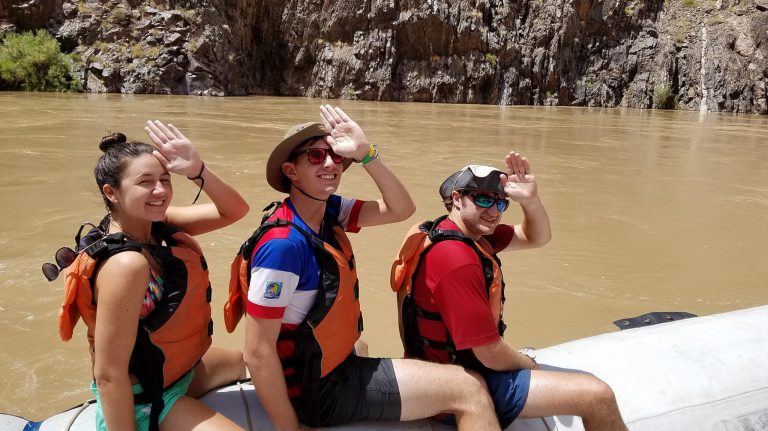 Anna Daniels (left), Robert Grady Pickering and Tom Fowlkes throw up a ‘Landshark’ sign during their visit to the Grand Canyon as part of their introductory excursion as Stamps scholars at the University of Mississippi. Photo courtesy James Asbill