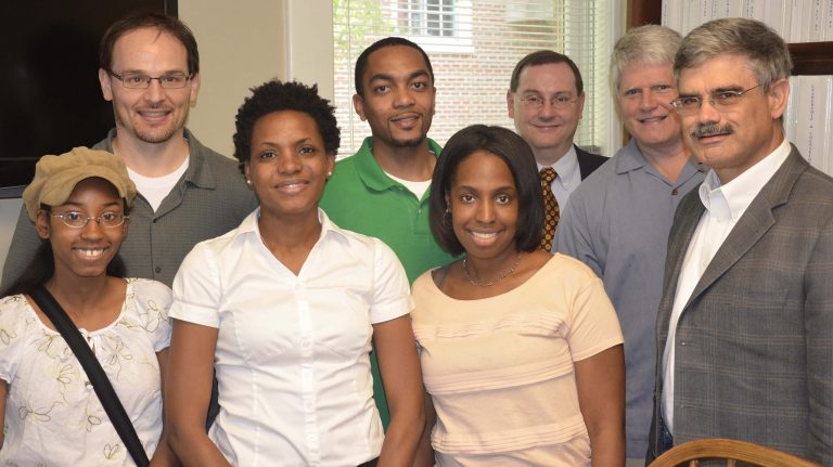 UM Department of Chemistry and Biochemistry African-American Ph.D. graduates 2012-2013 (front row, from left) Shana Stoddard, Kari Copeland, Jeffrey Veal, and Margo Montgomery. Not shown: Garry Brown. Also shown (back row, from left) are professors Greg Tschumper, Walter Cleland, Steven Davis and Maurice Eftink. (Submitted photo)