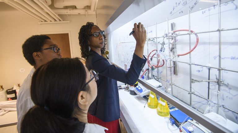 Davita Watkins (right), assistant professor of chemistry and biochemistry, works with students Briana Simms and Duong Ngo in her lab in Coulter Hall. Photo by Thomas Graning/Ole Miss Communications