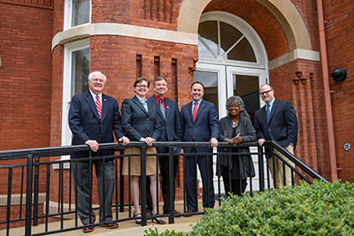 Charles L. Hussey (left), associate dean for research and graduate education, and Donald L. Dyer (third from left), associate dean for faculty and academic affairs, joined Dean Lee M. Cohen (third from right), Associate Deans Jan Murray (second from right) and Holly Reynolds (second from left), and Assistant Dean Stephen Monroe this year. 