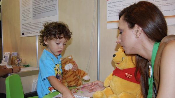 Christiana Christodoulou works with a participant in one of her language development research projects. Submitted photo
