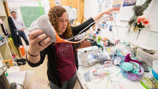 Christen Parker works on soft sculptures in her art studio. Her pieces will be on display April 2-6 at Southside Gallery in the exhibit ‘Chroma.’ Photo by Kevin Bain/Ole Miss Communications