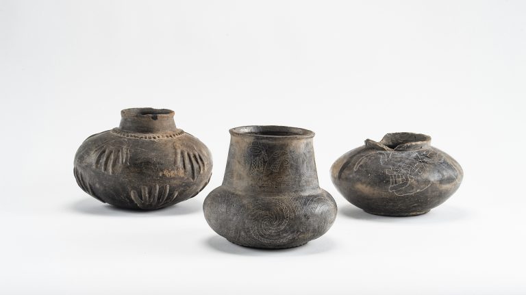 These ceramic objects from UM’s Davies collection, dating back to 1400, were used by Native Americans in the Mississippi Valley. The objects are on display at The Historic New Orleans Collection. Photo by Robert Jordan/Ole Miss Communications