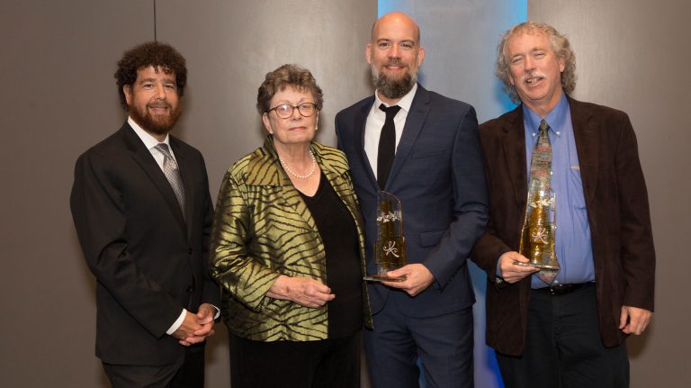 Jimmy Thomas, Ann Abadie, Odie Lindsey and Ted Ownby accept the Special Achievement Award on behalf of the UM Center for the Study of Southern Culture at the MIAL banquet. 