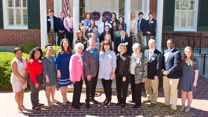 The Kelly Gene Cook Charitable Foundation board and Executive Director Katy Pacelli (front, fourth from left) joins Chancellor Jeff Vitter and Sharon Vitter for a spring luncheon to celebrate the Cook and Mikell Scholars. JoAnn Mikell (front, in pink), secretary; Carolyn Bost (front, fifth from right), director; Deborah Rochelle (front, fourth from right), chair; and Ron Page (front, third from right), treasurer; are surrounded by the undergraduate and graduate scholars at Ole Miss. 