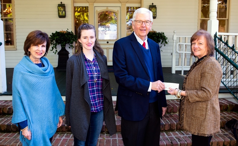 Karan (left) and Eric Clark of Oxford, present a check to Sandra Guest, vice president of the UM Foundation. The gift adds a $10,000 contribution to the existing John S. and Mamie Craft Clark Memorial Scholarship Endowment Fund at the University of Mississippi. Joining them is the 2018 Clark Scholar, Margaret Jordan, a freshman mathematics major from Pearl. 