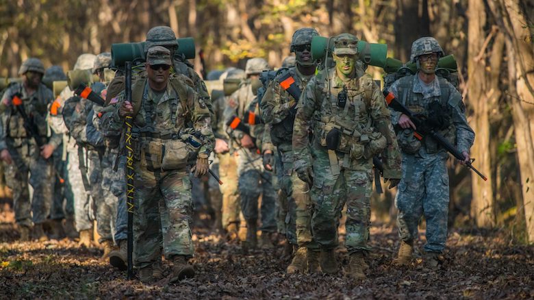 The University of Mississippi’s Army ROTC reached its 100th year in 2018. Pictured: Army ROTC cadets ruck march down UM’s South Campus Trails in 2017. Photo by Kevin Bain