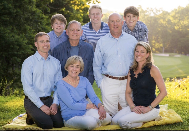 Dean Copeland (in dark blue shirt) is surrounded by family: (from left) son Braden; grandson Campbell Dickson (now 17); wife Linda; grandson Mac Dickson (now 22); son-in-law Tim Dickson; grandson Brody Dickson (now 19); and daughter Albie Dickson.