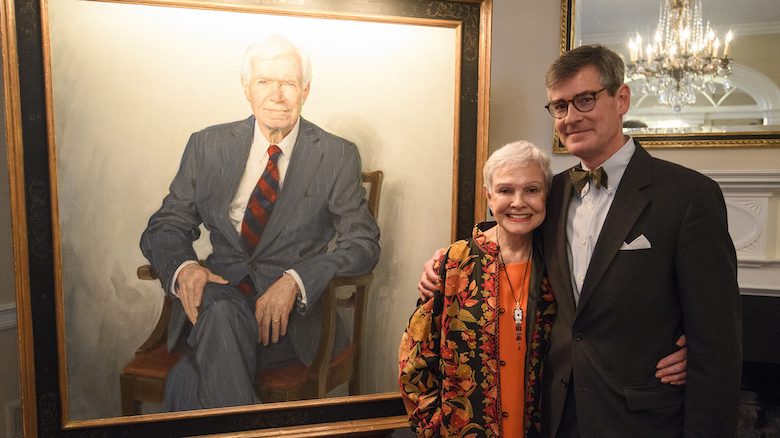 Kay Cochran and artist Jason Bouldin present Sen. Thad Cochran’s portrait that has been installed in the University of Mississippi research center bearing the senator’s name. Photo by Thomas Graning/