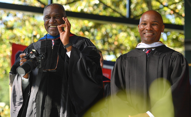 Donald Cole (left), pictured here with state Institutions of Higher Learning Trustee Shane Hooper at a UM Commencement, is being honored with a named scholarship for his devoted work as a faculty member, administrator, mentor and advocate. The Cole scholarship will assist African American Studies majors and encourage them to get involved in the university and pursue progressive change across Mississippi.