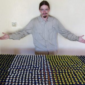 UM graduate J.P. Lawrence shows off clay models of dyeing poison frogs used in his work. He and a team of researchers began studying variations in color signals of the frogs in 2013 in French Guiana. The team has published its results in the Sept. 3 edition of Proceedings of the National Academy of Sciences.